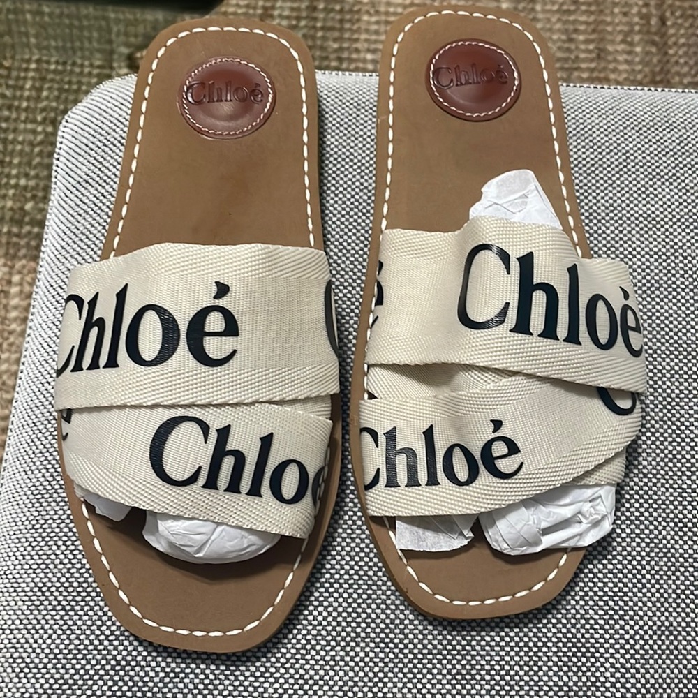 White and black sandals woody